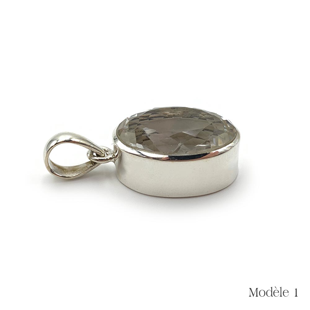 Pendentif en Cristal de roche cerclé en Argent Massif