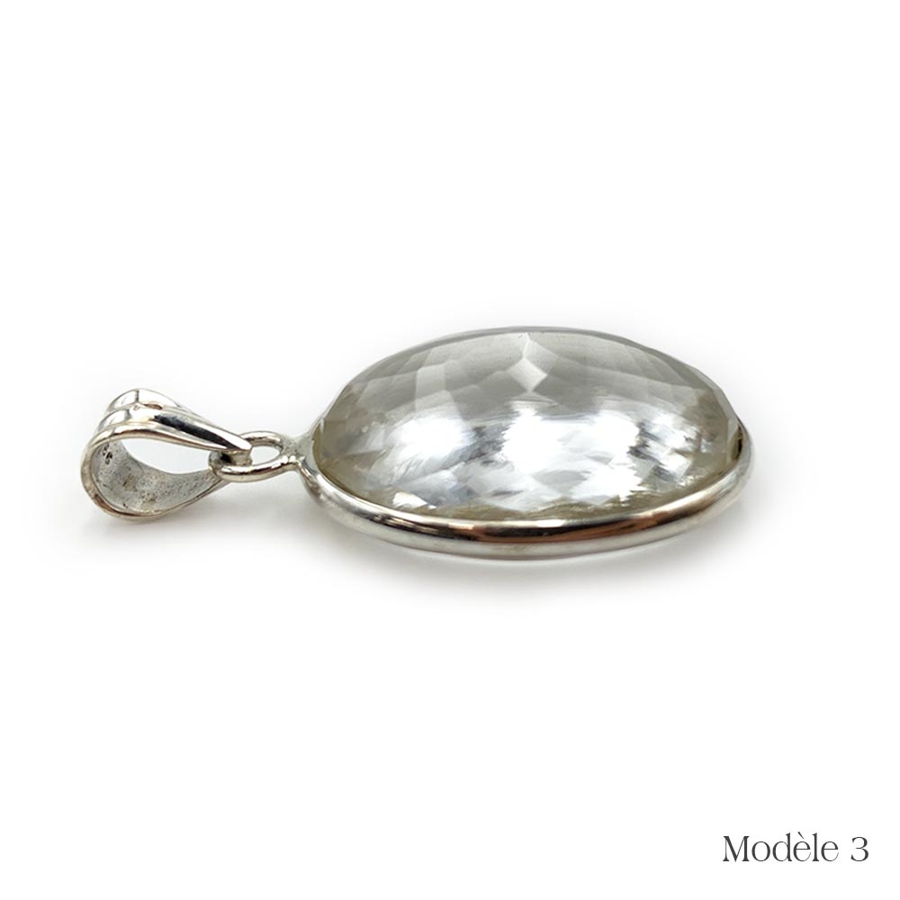 Pendentif en Cristal de roche cerclé en Argent Massif