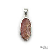 Pendentif en Rhodochrosite cerclé en Argent Massif